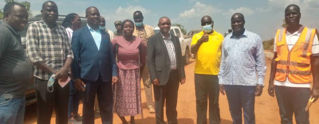 The Minister of Local Government fourth left Hon Raphael Magezi visited Omoro District to monitor the progress of Otema-Alimadi-Adak-Awalkok road under construction by the Project for the Restoration of Livelihoods in Northern Region (PRELNOR). The road works started in January 2022 by Kinkizi Traders Ltd who won the contract. The Hon. Minister was accompanied by the Resident District Commissioner Mr. Onyuk Andrew in a yellow T-shirt and the District Chairperson Okello Douglas Peter. Minister of Local Government monitors PRELNOR road